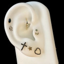 Piercing Cruz Oreja de Oro y Piedras Negras - 10 mm – TRANSIRE NEGRA